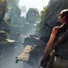 Lara Croft w cieniu grobowca, w otoczeniu zarośniętych ruin i gigantycznej kamiennej twarzy. To koszmar z Shadow of the Tomb Raider.