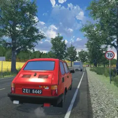 Czerwony Fiat 126p jedzie drogą w letni dzień. To widok z gry, gdzie można poczuć klimat podróży.