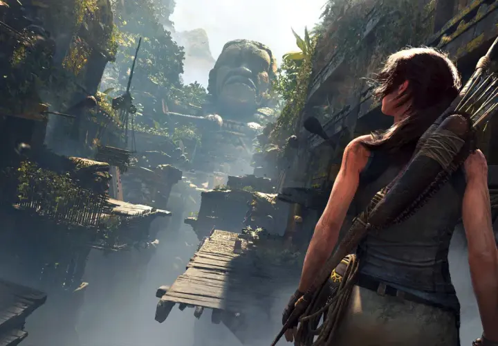 Lara Croft w cieniu grobowca, w otoczeniu zarośniętych ruin i gigantycznej kamiennej twarzy. To koszmar z Shadow of the Tomb Raider.