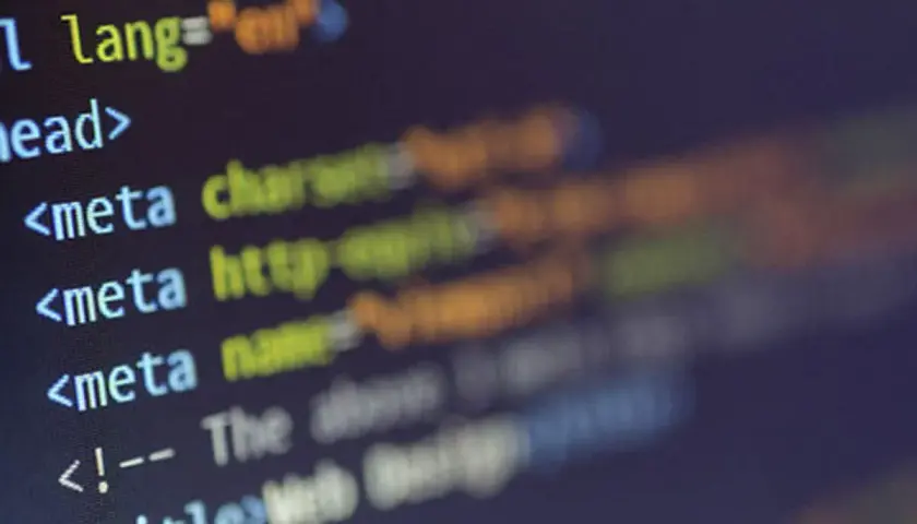 Fragment kodu HTML, pokazujący podstawy, jak zrobić stronę internetową HTML.
